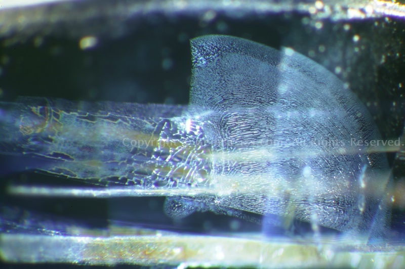 Boehmite and polysynthetic twinning in magmatic sapphire